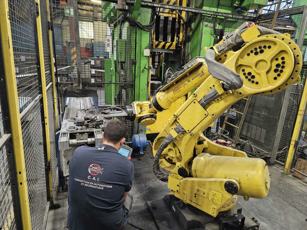 Intégration de nouvelles références sur un îlot robotisé Fanuc existant. Reprise du code, trajectoires, points et modifications automates TSX37 réalisées par C.A.I pour une production optimisée.